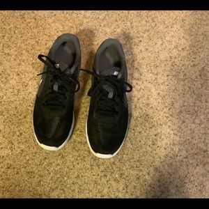 Women’s black Nike running shoes